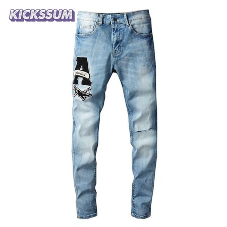 Amiri Logo Patch Rip Jeans Blue